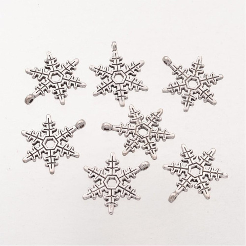 Zawieszka płatek śniegu 23x17,5mm, 1szt. Zawieszka płatek śniegu 23x17,5mm, 1szt.